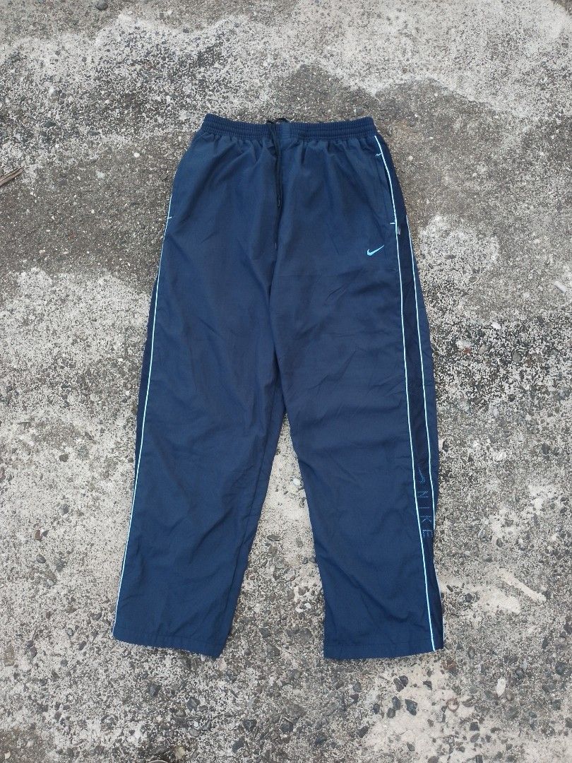 Vintage Nike Alpha Project Track Pants (Category: Activewear) located in Baguio. Submitted by bado.feels (Listing ID 1467413991, Image 1). Description: Color: Dark Navy Blue Color Rate: 9/10 Size 28-34 Length 40 Thigh 12 Leg Opening 12 899+sf.