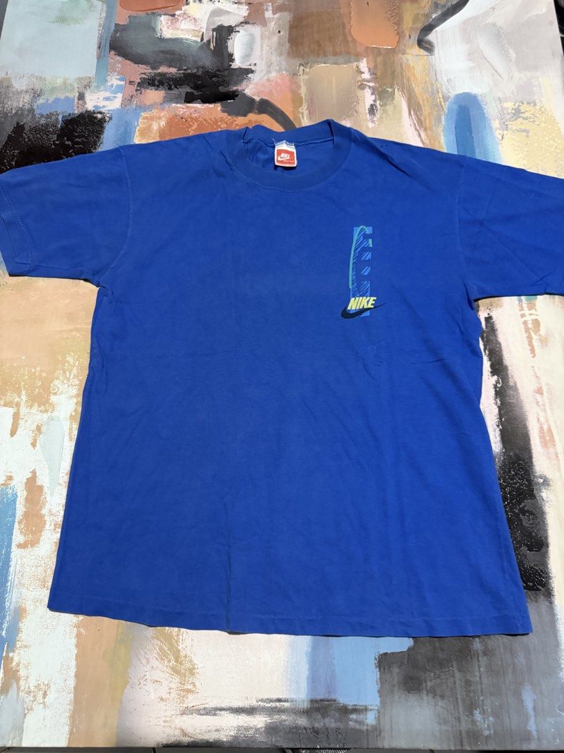 Vintage nike tshirt (Category: Tshirts & Polo Shirts ) located in Las Pinas. Submitted by thrftmnl. (Listing ID 1467426500, Image 1). Description: Vintage nike Tshirt Size: ONE SIZE on tag (fits Large) Width: 21 Length: 27.5 Issue: pinhole.