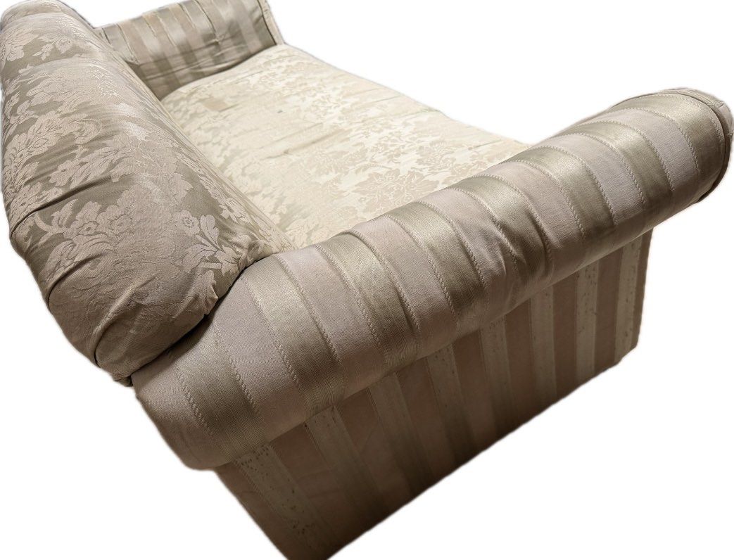 Vintage patterned 3-seater sofa with striped armrests (Category: Sofas) located in Taguig. Submitted by kgonda (Listing ID 1467430942, Image 3). Description: - Type: Vintage 3-seater sofa - Design: Scalloped back with floral backrest/seat cushions and striped rolled armrests and base skirt - Frame: Sturdy solid wood underneath - Condition: Noticeable wear, fabric fraying, and tear lines on the seat cushions; stuffing has lost some firmness - Idea