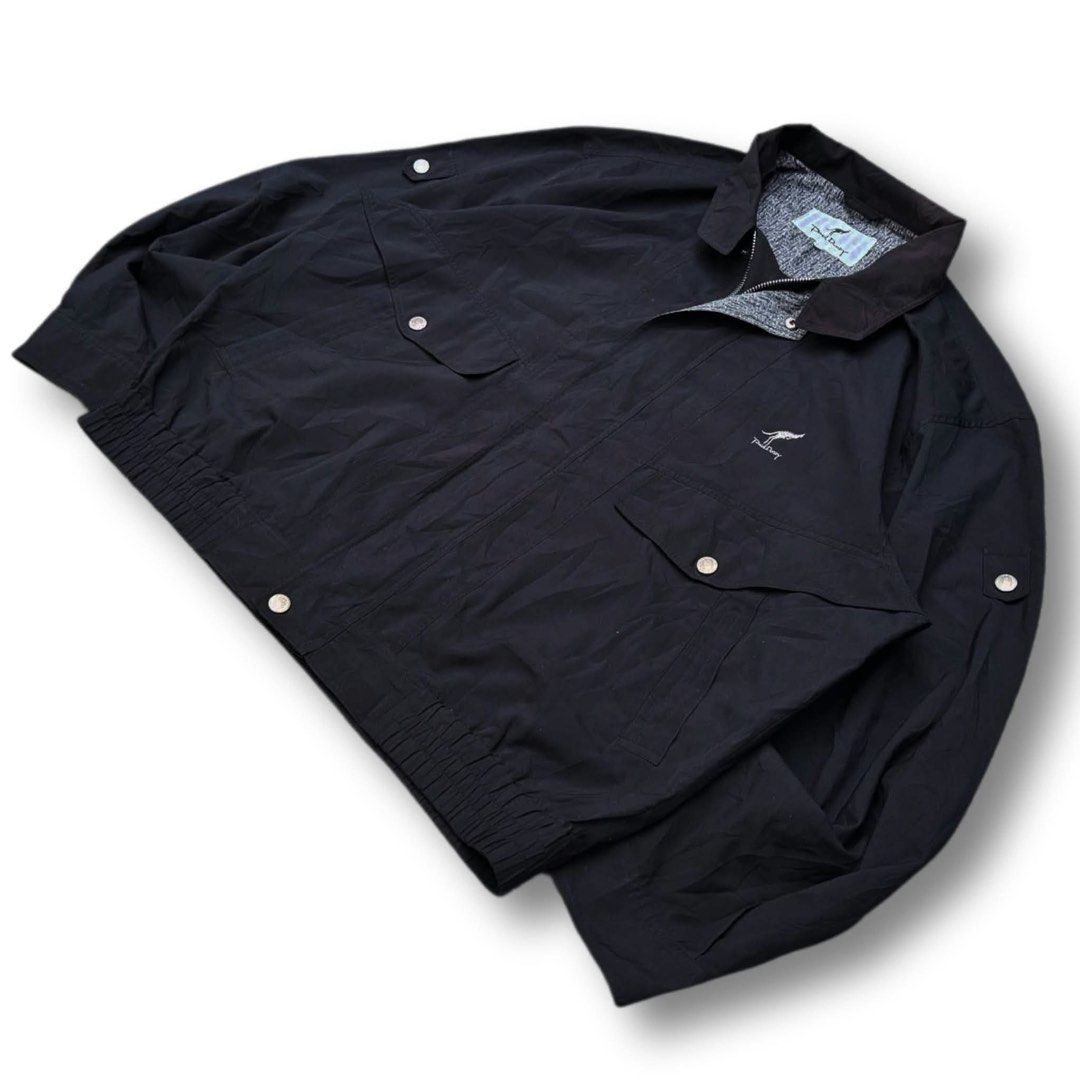 Vintage Paul Dundy Pilot Bomber Jacket (Category: Coats, Jackets and Outerwear) located in Manila. Submitted by vvyein_ (Listing ID 1467547309, Image 1). Description: - Brand: Paul Dundy (Japanese brand) - Color: Classic Black - Design: Embroidered kangaroo logo on the chest with stylish contrasting grey patterned inner collar and zipper trim - Pockets: Functional snap-button chest pockets - Fit: Classic bomber style with a ribbed hem and button 