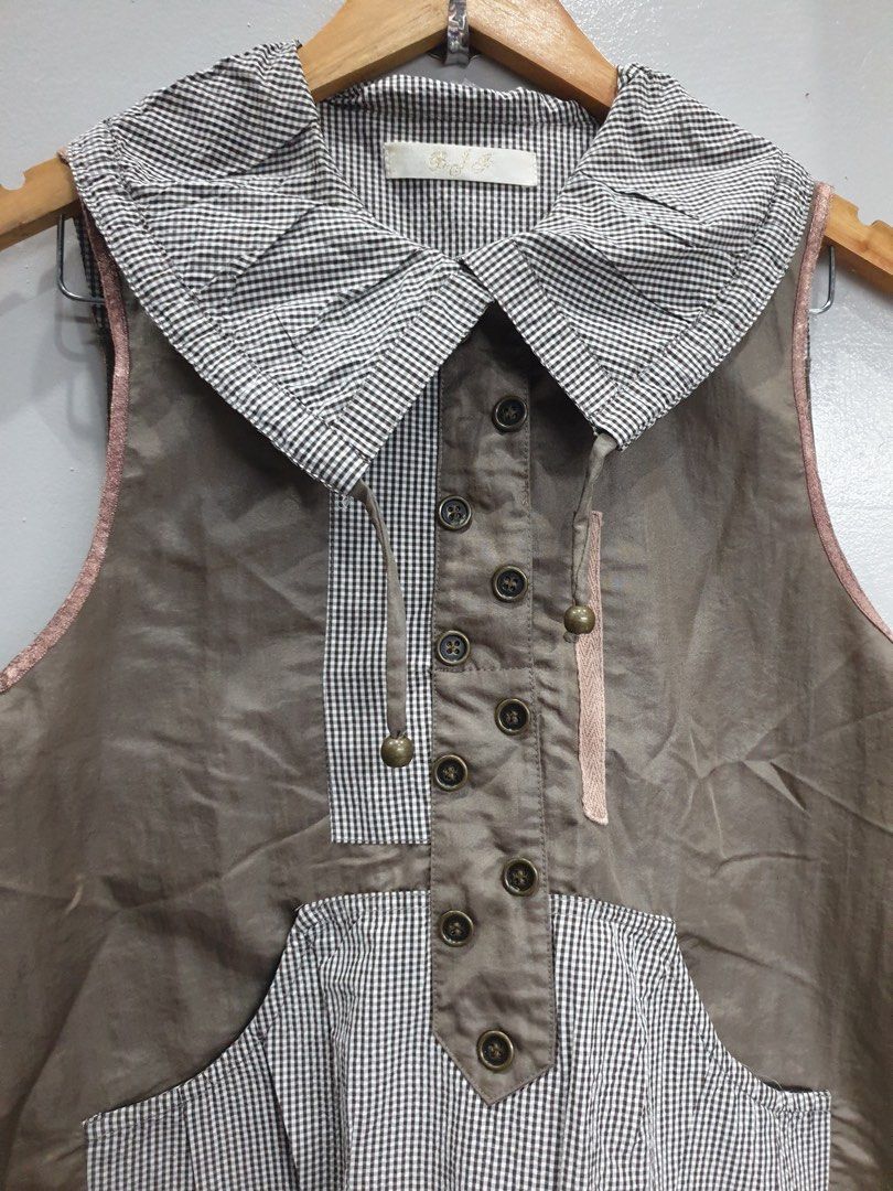 Vintage style sleeveless unique top gingham-patterned oversized collar and front pocket. (Category: Others Tops) located in Calamba. Submitted by mimabuy (Listing ID 1467391463, Image 2). Description: I really like this top so the price is fixed im taking this if no one buys hehe Size: medium.