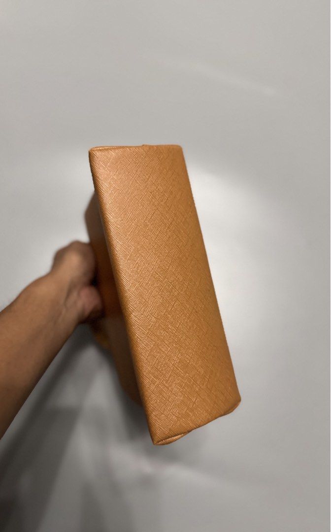 Vintage Tan Structured Top Handle Handbag Gold Hardware (Category: Luxury Bags & Wallets) located in Alaminos. Submitted by outfitcheck.ph (Listing ID 1467485254, Image 2). Description: - Color: Classic Tan - Material: Pebbled saffiano-style texture - Hardware: Elegant gold-tone metal balls - Closure: Secure front flap turn-lock - Interior: Smooth cream-lined flap - Size: Compact, ideal for daily essentials - Condition: Clean stitching throughout