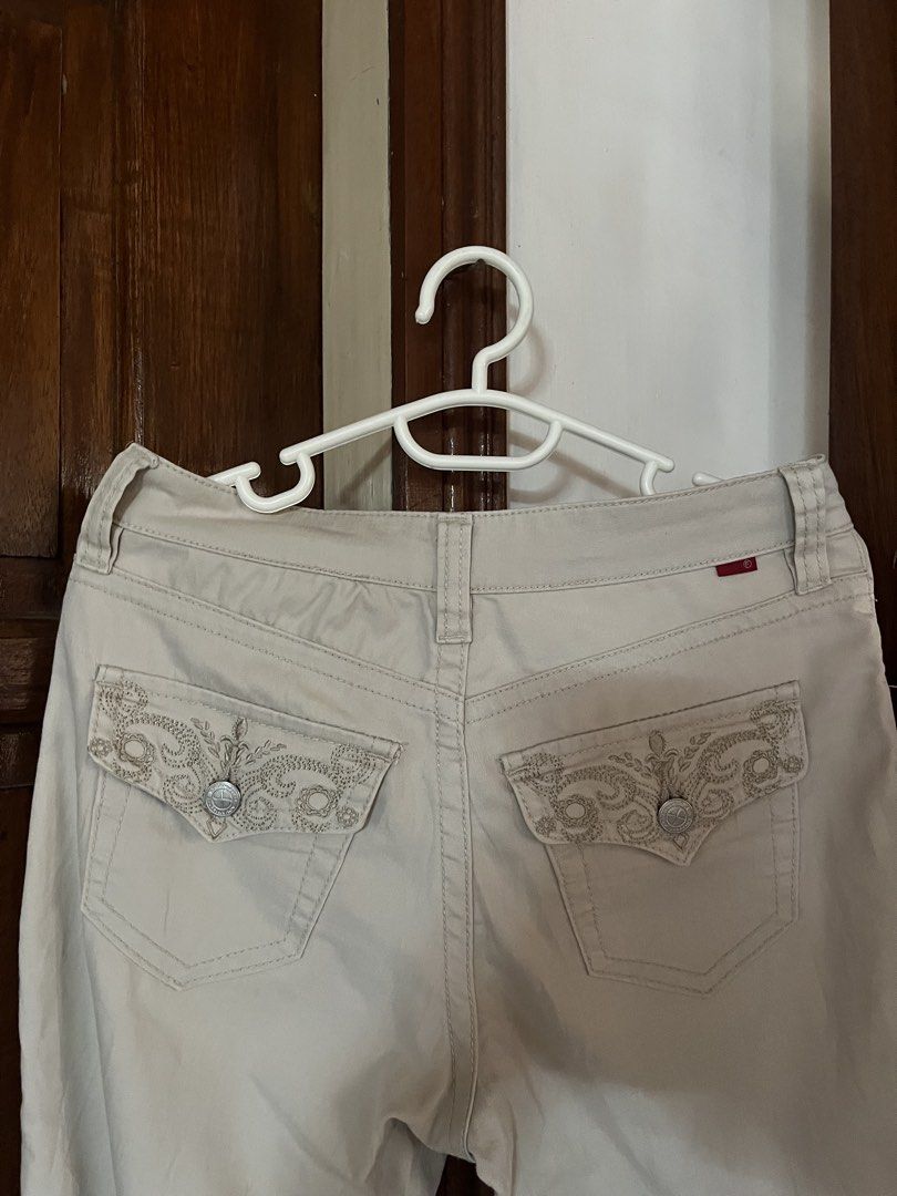Vintage-Inspired Embroidered Capri Pants (Category: Jeans) located in Dagupan City. Submitted by whimsyluns (Listing ID 1467382406, Image 2). Description: cream beige capri pants with beautiful embroidered details and cute cuffed hems! Perfect for a soft vintage, cottagecore, casual y2k-inspired outfit ⭐️🫶🏻 size: 28inch length:28inch color: beige/cream (may vary due to lighting) preloved item .