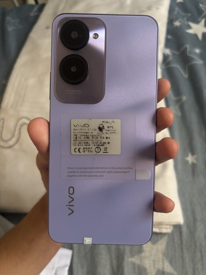 Vivo Y18 5G (Category: Vivo) located in Calumpit. Submitted by edrianpangilinan (Listing ID 1467456827, Image 1). Description: 📲 VIVO Y18 - Korean variant/premium copy - 5G ready - 12GB RAM / 512GB Internal Storage - Android 14 - Side-mounted fingerprint scanner, 3.5mm headphone jack, USB-C port - With box & Earphones - Color: Starry Purple Issue: • May crack sa rear cam but not affected when taking pictures 📌 Loc: Pasig – Open for meet-up.
