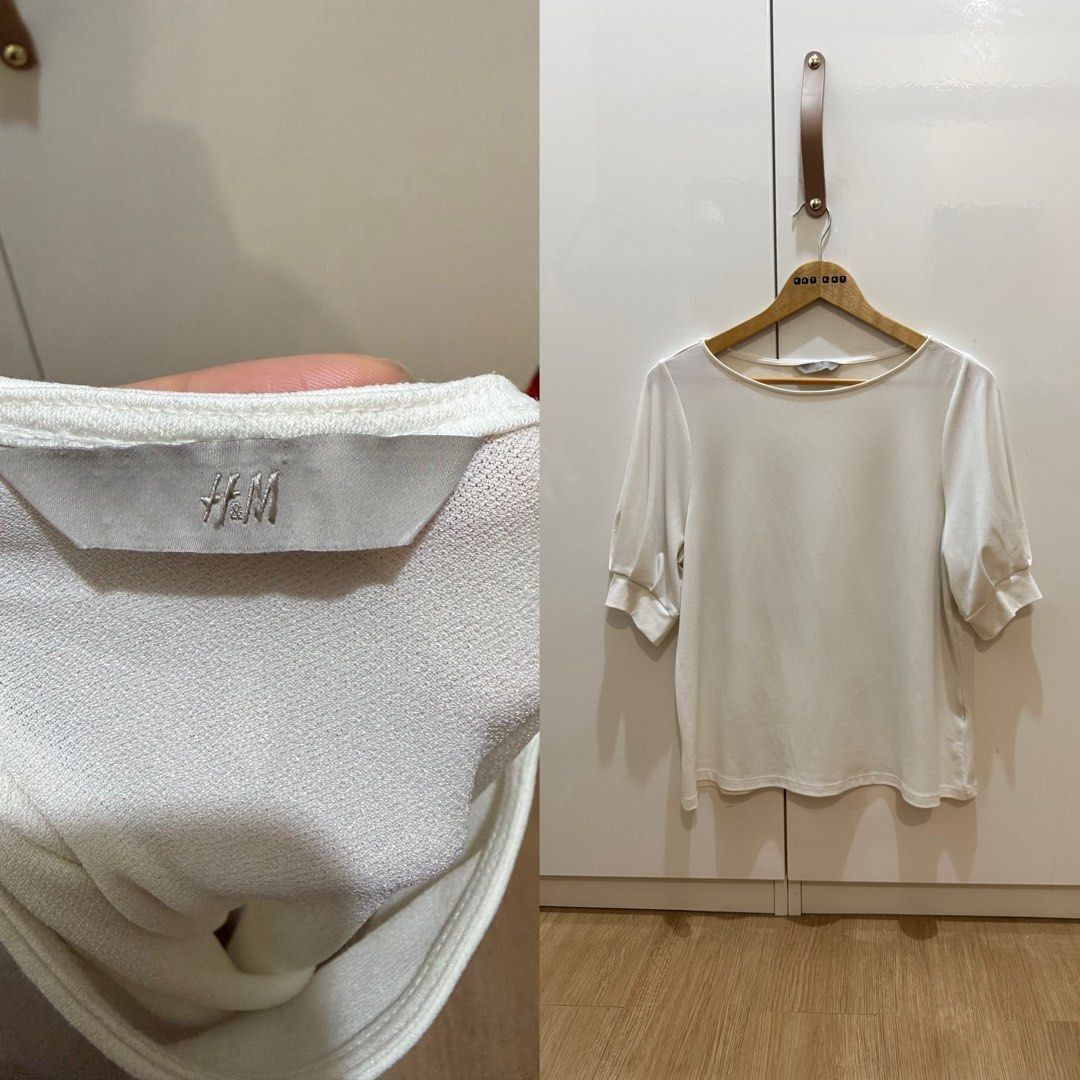 W H&M puff sleeve blouse 01950 (Category: Blouses) located in Paranaque City. Submitted by kkattspreloved2 (Listing ID 1467492560, Image 1). Description: - Brand: H&M - Item: Puff sleeve blouse (Model 01950) - Color: White - Style: Chic, versatile, great for casual or office wear - Condition: Excellent pre-loved / as shown in photos - Measurements: Please refer to the tape measure photos for exact sizing ❗️Items are already washed and ready to we