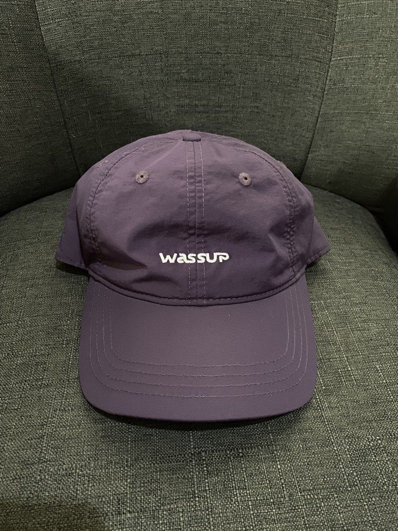 Wassup Purple Nylon Cap Hat (Category: Caps & Hats) located in Bulacan. Submitted by _myarchive (Listing ID 1467381744, Image 2). Description: - Brand: Wassup - Color: Purple - Material: Lightweight nylon with inner mesh lining - Design: Embroidered brand logo on the front - Details: Branded interior seam taping and clean sweatband - Fit: Adjustable back strap with metal buckle.