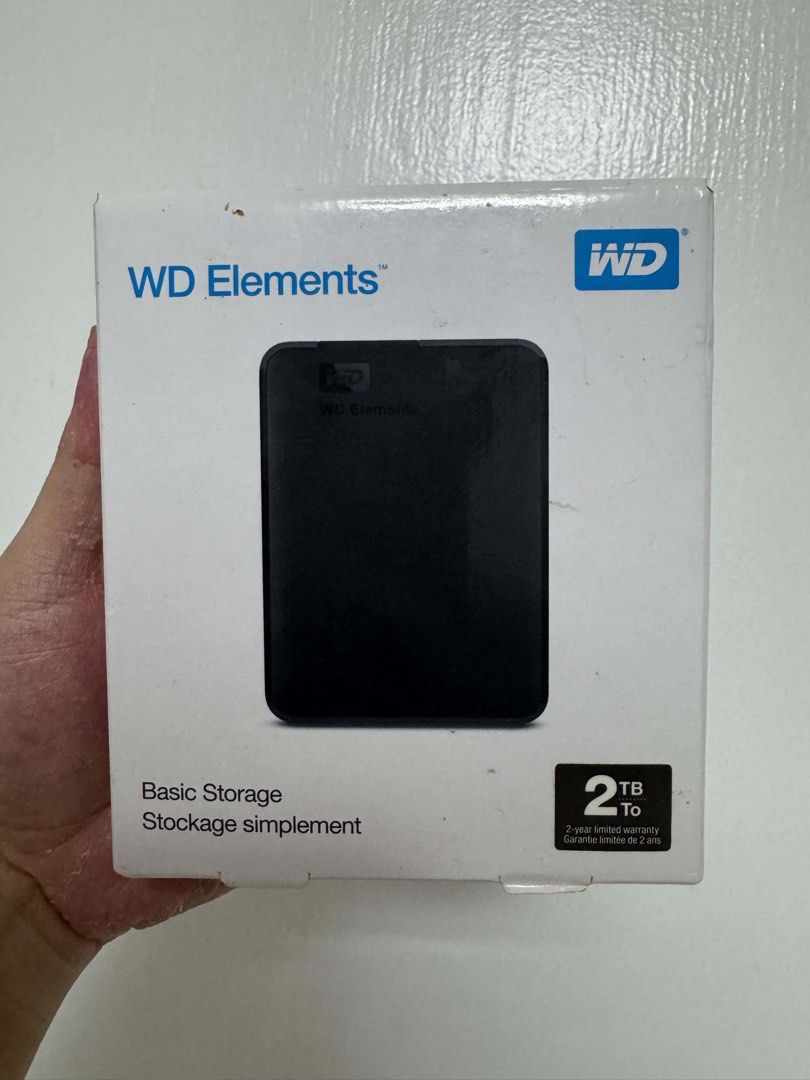 WD Elements 2TB Portable External Hard Drive (Category: Hard Disks & Thumbdrives) located in Manila. Submitted by shoppolaflora (Listing ID 1467504941, Image 1). Description: - Brand: WD Elements - Capacity: 2TB portable storage - Compatibility: Plug and play for Windows and Mac - Inclusions: USB 3.0 cable and original packaging box .