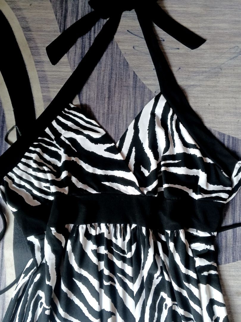 WEATSEAL (Category: Others Tops) located in Manila. Submitted by icamalicdem29 (Listing ID 1467466017, Image 3). Description: vintage Y2K-era Wet Seal black and white zebra print halter dress featuring a plunging V-neckline, an empire waist with solid black trim, and matching attached waist ties..