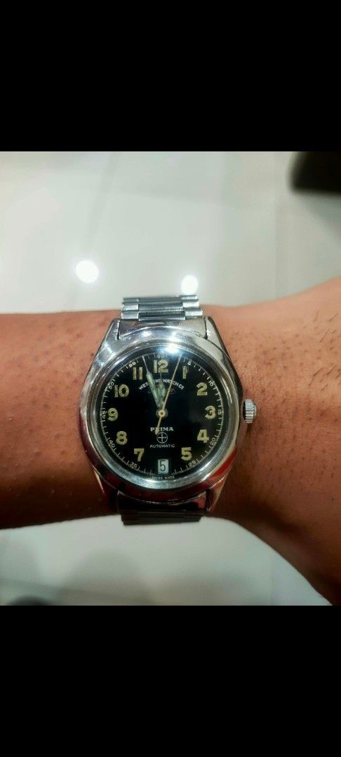 West End Watch Co. Sowar Prima Automatic Watch (Category: Men's Watches) located in Meycauayan. Submitted by redvipergf (Listing ID 1467404090, Image 1). Description: - Brand/Model: West End Watch Co. Sowar Prima Automatic Watch - Dial: Black dial with bold Arabic numerals and date window at the bottom - Build: Durable stainless steel case with a comfortable metallic stretch bracelet - Condition: Keeps time well; shows normal wear marks from regu