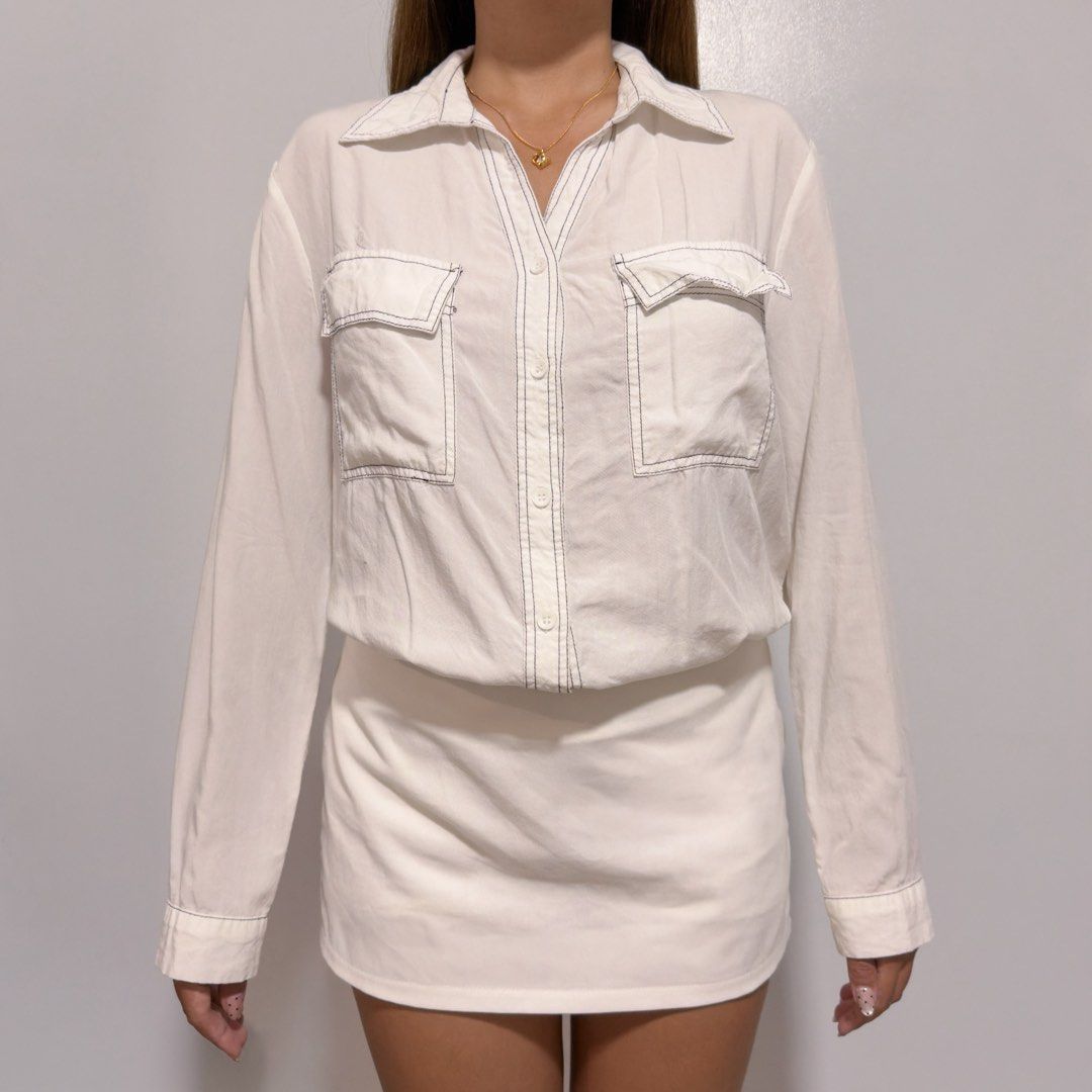 white button down top (Category: Longsleeves) located in Cebu City. Submitted by cuteoncue (Listing ID 1467588608, Image 1). Description: small-med please see last photo for barely visible stain. the item was freshly laundered but not soaked or stain-treated..