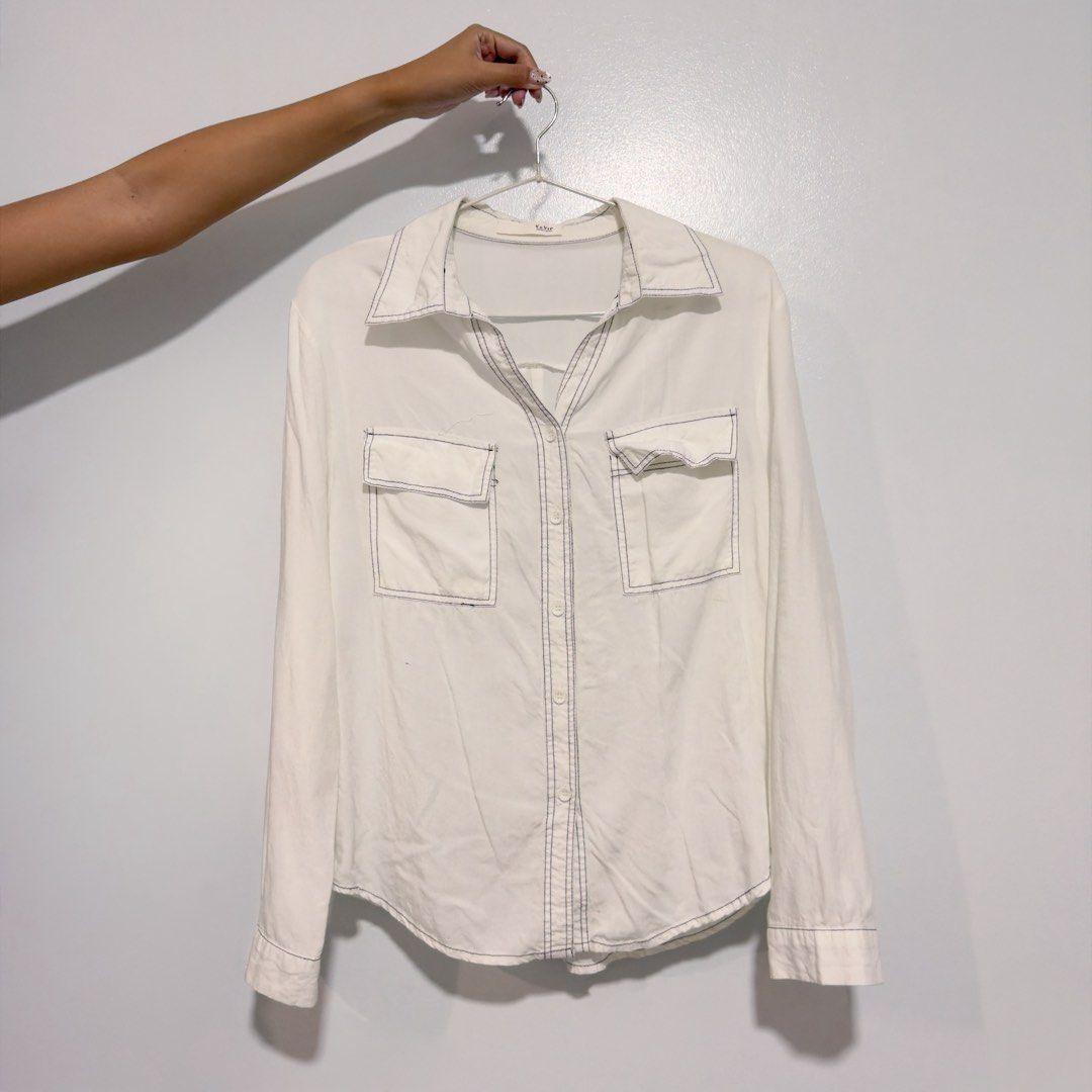 white button down top (Category: Longsleeves) located in Cebu City. Submitted by cuteoncue (Listing ID 1467588608, Image 2). Description: small-med please see last photo for barely visible stain. the item was freshly laundered but not soaked or stain-treated..