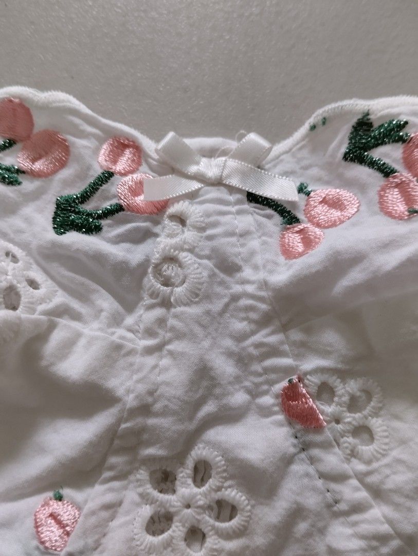 Pre-loved WHITE EYELET CHERRY EMBROIDERED CROP TOP BRALETTE - Size Medium Small (Category: Sleeveless) located in Paranaque City. Submitted by SpencersMommy (Listing ID 1467436080, Image 3). Description: EYELET BRALETTE / CROP TOP *pre-loved, 8/10 condition Color: White with Pink Cherry Embroidery Size on tag: M (will fit Small-Medium) Measurements when laid flat: Armpit to armpit 13.5 inches, stretchable to 15.5 inches Length 14 inches > stretch