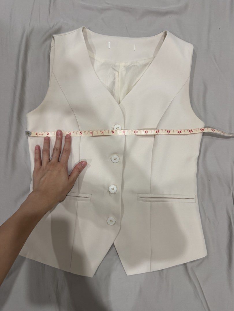 White cream classy button vest top (Category: Sleeveless) located in Davao. Submitted by mslbt (Listing ID 1467381623, Image 2). Description: Forgot the brand Super nice & high quality Fits small-medium No when worn photo Last price already.