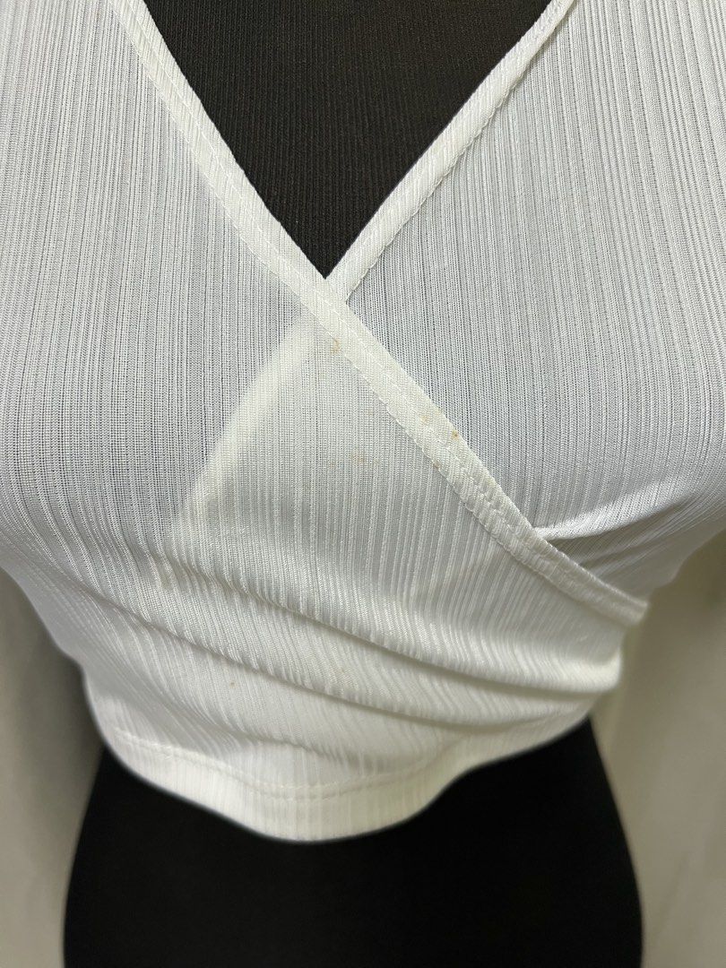 White crop top (Category: Shirts) located in Las Pinas. Submitted by jilanah (Listing ID 1467560485, Image 2). Description: HAS SMALL STAIN BARELY NOTICEABLE.