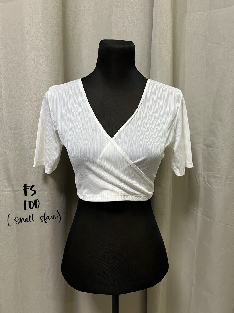 White crop top (Category: Shirts) located in Las Pinas. Submitted by jilanah (Listing ID 1467560485, Image 1). Description: HAS SMALL STAIN BARELY NOTICEABLE.