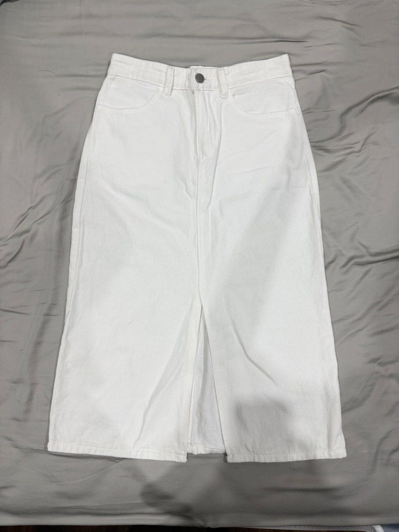 White denim midi skirt (Category: Skirts) located in Davao. Submitted by mslbt (Listing ID 1467376619, Image 1). Description: Best fits waist 25-27in Length 28in Closet staple! .