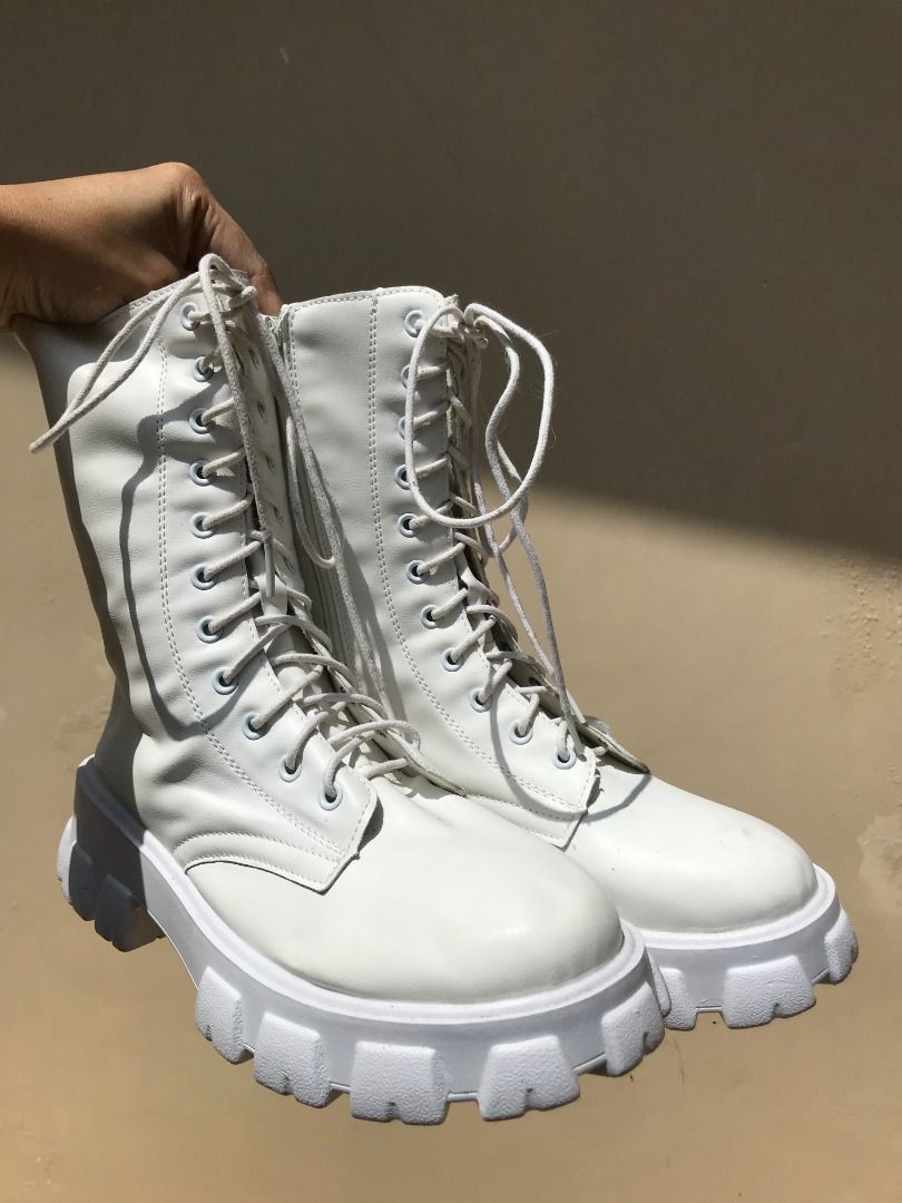White Lace-Up Chunky Platform Combat Boots (Category: Boots) located in Quezon City. Submitted by ezrakeith (Listing ID 1467565871, Image 1). Description: - Color: Clean white finish - Style: Mid-calf platform combat boots with chunky lug soles - Closure: Lace-up front with a convenient inner side zipper for easy wear - Traction: Sturdy soles offering solid grip - Versatility: A solid statement piece for everyday styling.