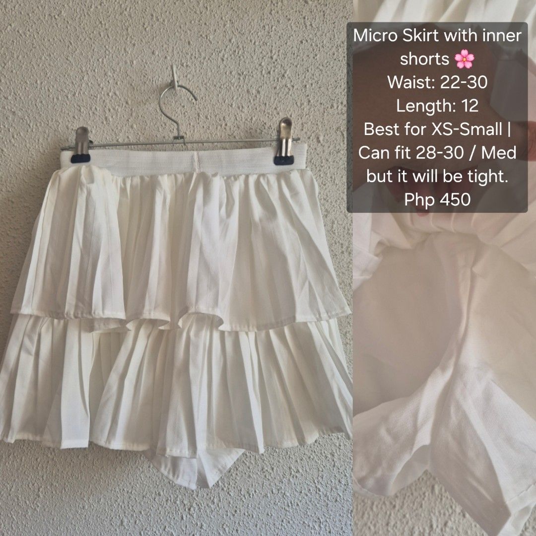 White Micro Skirt with Inner Shorts (Category: Skirts) located in Manila. Submitted by belovedbyjess (Listing ID 1467404901, Image 1). Description: - Color: White - Style: Layered pleated micro skirt with built-in inner shorts - Waist: 22 to 30 inches (Stretchy waistband) - Length: 12 inches - Fit: Best for XS to S frames (Can fit up to medium / 28-30 waistline, but will be quite tight) - Price: Php 450.