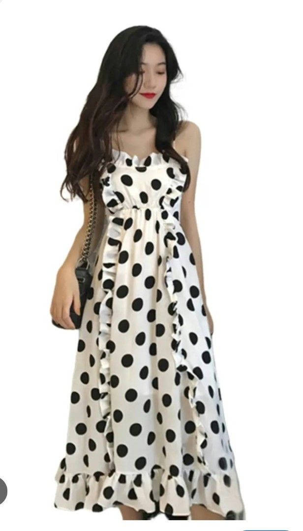 White Polka Dot Ruffle Maxi Dress Spaghetti Strap (Category: Dresses) located in Manila. Submitted by duffy-080 (Listing ID 1467496796, Image 1). Description: - Color/Pattern: Classic white with black polka dots - Length: Maxi dress - Design: Sweet ruffle trim along neckline and front panels - Straps: Fully adjustable spaghetti straps - Waistline: Comfortable elastic waist for a great fit - Fabric: Lightweight and flowy, perfect for warm weather 