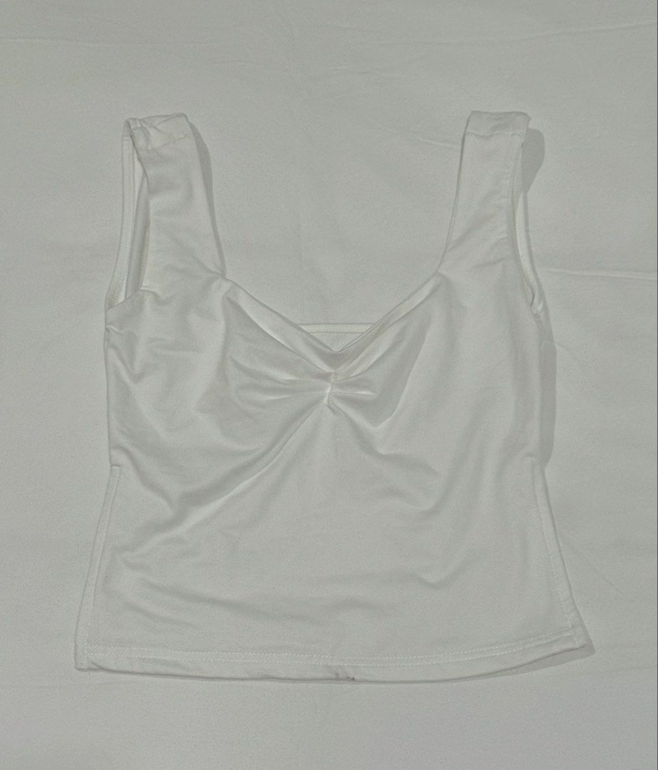 White Ruched Front Tank Top (Category: Sleeveless) located in Pasig City. Submitted by mxvxt (Listing ID 1467464711, Image 2). Description: 〰 in good condition, used once 〰 fits XS-S frame 〰 lightweight and breathable fabric 〰 has slits on both sides 〰 cute & dainty european summer top! 〰 rfs: decluttering .