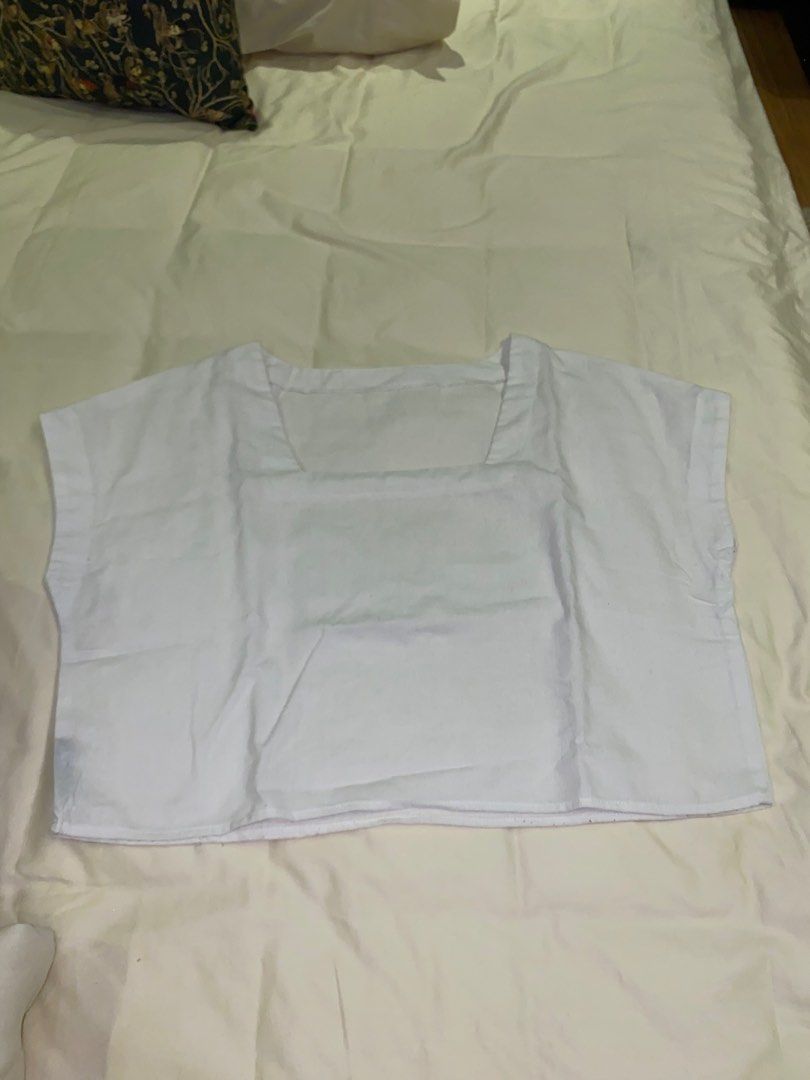 White Square Neck Crop Top Short Sleeve Linen (Category: Shirts) located in Bacoor. Submitted by sad.burrito (Listing ID 1467491449, Image 1). Description: Plain white short-sleeve linen top with a trendy square neckline and a flattering waist-length boxy cut. Lightweight, versatile, and easy to pair with any high-waisted bottoms for a clean, casual everyday look. 📦 Lalamove/LBC, shipping fee shouldered by buyer 📍 Bacoor, Cavite.