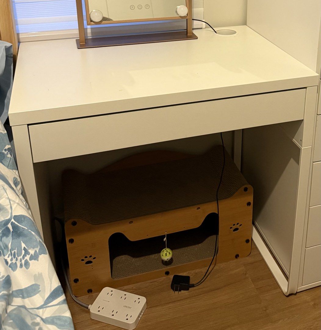 White Study Desk with Drawer (Category: Office Furniture & Fixtures) located in Manila. Submitted by hiyukisawadikah (Listing ID 1467465490, Image 1). Description: - Color: Clean white - Features a smooth flat top surface and a convenient single pull-out drawer - Built-in cord management hole on the right corner to keep wires neat - Supported by sturdy metal legs on the right side - Minimalist design, ideal for a bedroom workspace or vanity setup