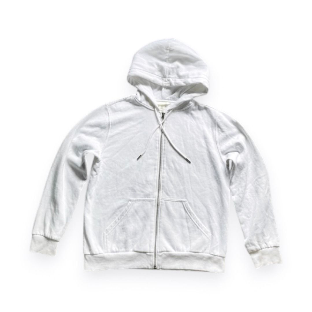 White Zip-Up Hoodie (Category: Coats, Jackets and Outerwear) located in Rizal. Submitted by sheeraay (Listing ID 1467465667, Image 1). Description: - Brand: H&M - Size: Medium (Regular fit) - Color: Clean White - Material: Cotton blend with soft fleece lining - Details: Silver-toned metal zipper, matching drawstrings with metal aglets, and double-layer hood.