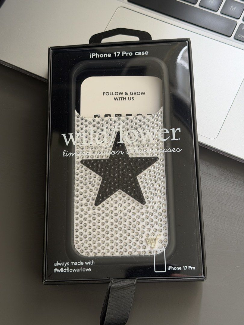 Wildflower Rhinestone White and Black Star (Category: Cases & Sleeves) located in Valenzuela. Submitted by 2chad4chad (Listing ID 1466650654, Image 1). Description: BRAND NEW for Iphone 17/18 pro Grab/lalamove ready 2,500 today only.