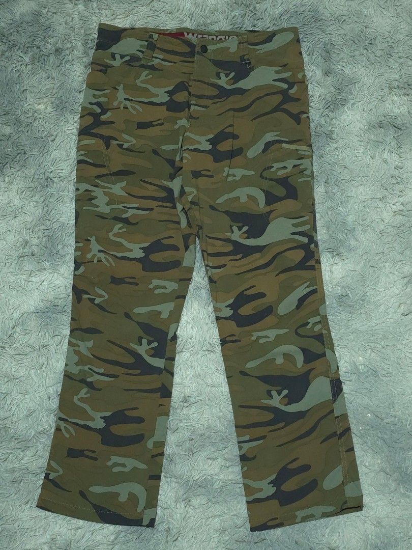 Wrangler Camouflage Cargo Pants (Category: Jeans) located in Abulug. Submitted by humanwhosellthings (Listing ID 1467365959, Image 1). Description: WRANGLER CAMOU Hiking Pants ✅Excellent Condition ✅Issue: none ▫️Waist Size: 34 ▫️Length: 40 - Color/Print: Green camouflage - Fit: Standard fit - Features: Multiple utility pockets, secure zippered leg pocket, belt loops, and front button closure - Material: Durable fabric built for outdoor activities