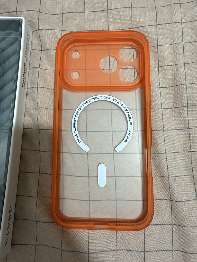 X One Dropguard 2S (Category: Cases & Sleeves) located in Mandaluyong City. Submitted by getbounced (Listing ID 1467468624, Image 3). Description: - Brand: X-One - Model: Dropguard 2S - Compatibility: iPhone 17 Pro Max (6.9") - Color: Vibrant Orange with Frost Matte finish - Protection: 20FT drop-tested with DNA Guard & Edge Guard technology - Condition: Like New - Used for 2 days only .