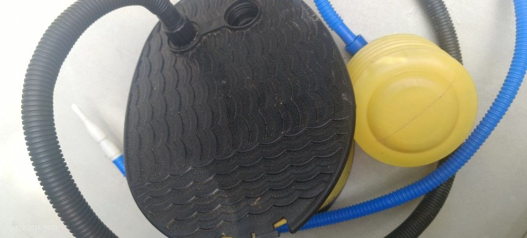 Yellow and Black Foot Pump with Hoses (Category: Heels) located in Makati City. Submitted by livelion_c59905 (Listing ID 1467380496, Image 3). Description: - Color: Yellow and black - Design: Bellows-style with textured top plate for a secure, non-slip grip - Included: Flexible black hose, blue secondary hose, and multiple nozzle attachments - Ideal for: Air mattresses, pool floats, and small boats - Condition: Brand new and ready to use - Shippi