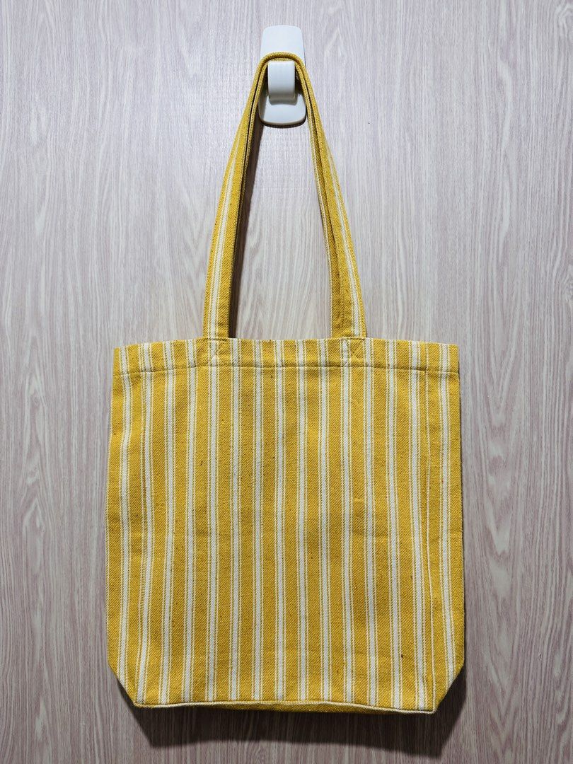Yellow Stripe APC Tote Bag (Category: Tote Bags) located in Quezon City. Submitted by mikemofu (Listing ID 1466962450, Image 2). Description: Authentic APC Canvas material and natural color (inner is same white and yellow color) Rare seasonal item Unisex.