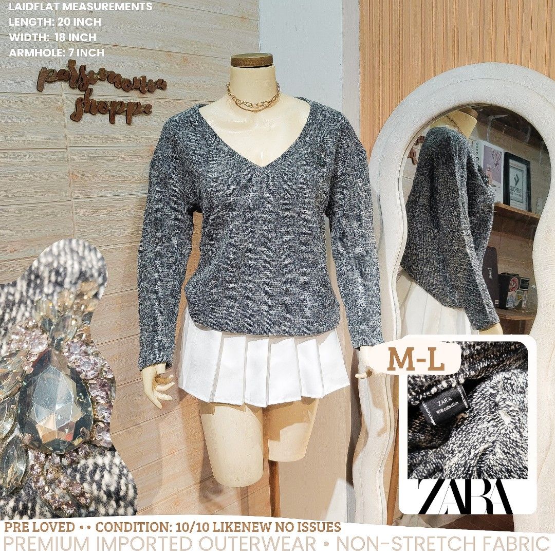 ZARA Authentic VNeck Knit pullover with Rhinestone Brooch Freesize Top (Category: Coats, Jackets and Outerwear) located in Bulacan. Submitted by alyssarys (Listing ID 1466152303, Image 1). Description: Authentic ZARA no issues , Preloved (cut tag only) - Color/Pattern: Black and white speckled knit - Design: Long sleeves with a deep V-neckline - Detail: Removable rhinestone crystal brooch on the chest - Fabric: Soft and textured for ultimate warm