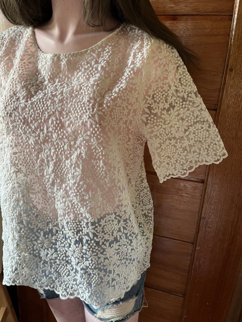 Zara Basic Embroidered Lace Short Sleeve Blouse Size L (Category: Blouses) located in Tandag. Submitted by maryarlale42144 (Listing ID 1467368461, Image 2). Description: - Brand: Zara Basic - Color: White - Material: Sheer mesh with intricate floral embroidery - Design: Short sleeves and round neckline - Origin: Made in Spain - Size: EUR L, USA L, MEX 30 - Condition: Excellent pre-loved condition (ready to wear).