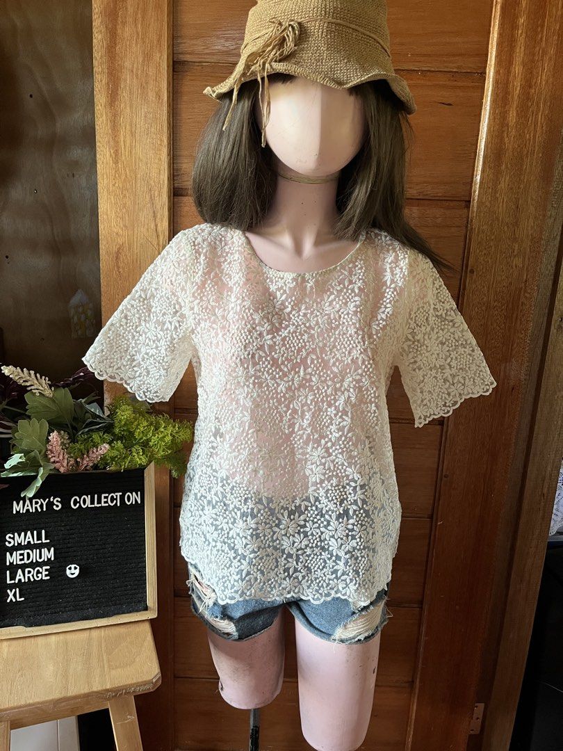 Zara Basic Embroidered Lace Short Sleeve Blouse Size L (Category: Blouses) located in Tandag. Submitted by maryarlale42144 (Listing ID 1467368461, Image 1). Description: - Brand: Zara Basic - Color: White - Material: Sheer mesh with intricate floral embroidery - Design: Short sleeves and round neckline - Origin: Made in Spain - Size: EUR L, USA L, MEX 30 - Condition: Excellent pre-loved condition (ready to wear).