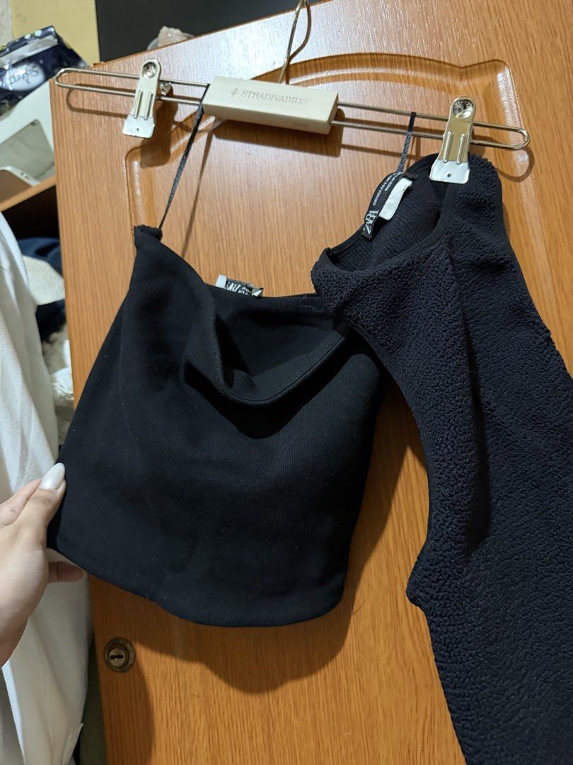 Zara Black Crop Tops Bundle (Category: Shirts) located in Muntinlupa City. Submitted by biancaagbscloset (Listing ID 1467576951, Image 2). Description: - Brand: Zara - Size: XS - Quantity: Set of 2 black crop tops - Style 1: Textured bubbly fabric with a classic round neckline - Style 2: Strapless tube top design featuring a delicate attached thin strap - Features: Versatile, easy to style, and essential basic wardrobe staples.