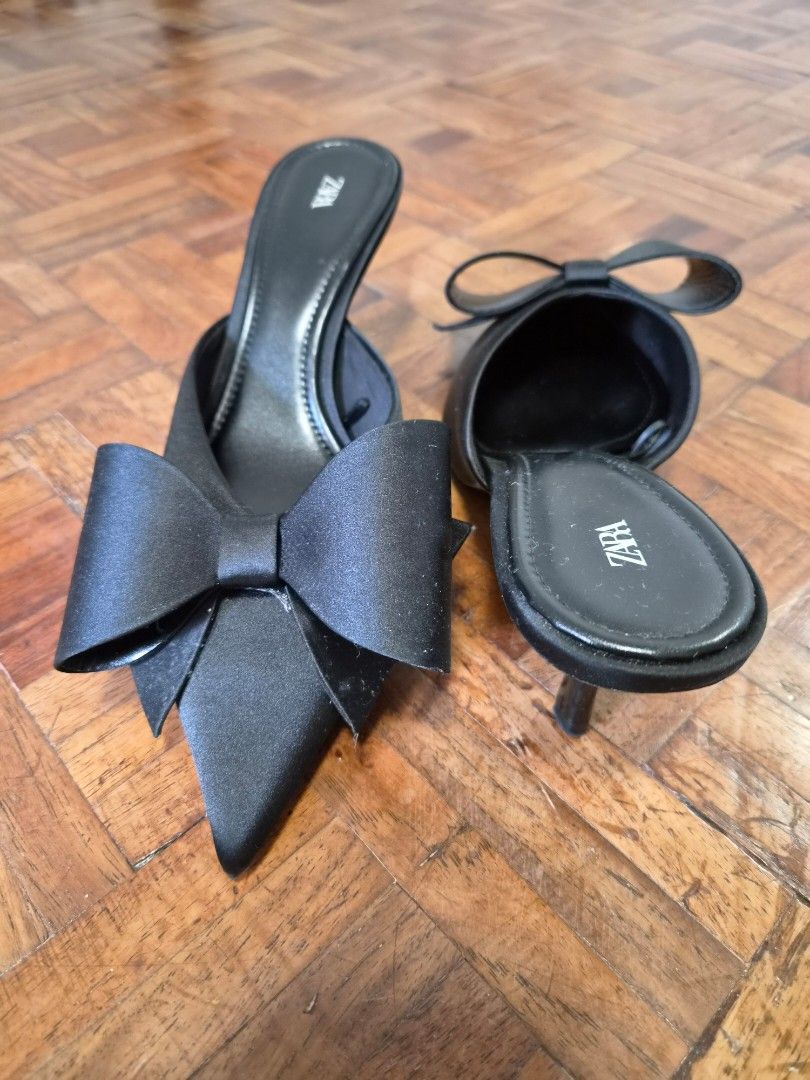 Zara Black Satin Bow Pointed Toe Mules Size EUR 39 (Category: Heels) located in Quezon City. Submitted by ShopPDplusK (Listing ID 1467421721, Image 2). Description: - Brand: Zara - Style: Slip-on kitten heel mules - Color: Black - Material: Satin - Size: EUR 39 - Design Details: Chic pointed toe with a large statement bow on the front - Condition: Excellent, minor scuffing on soles from indoor try-ons only.