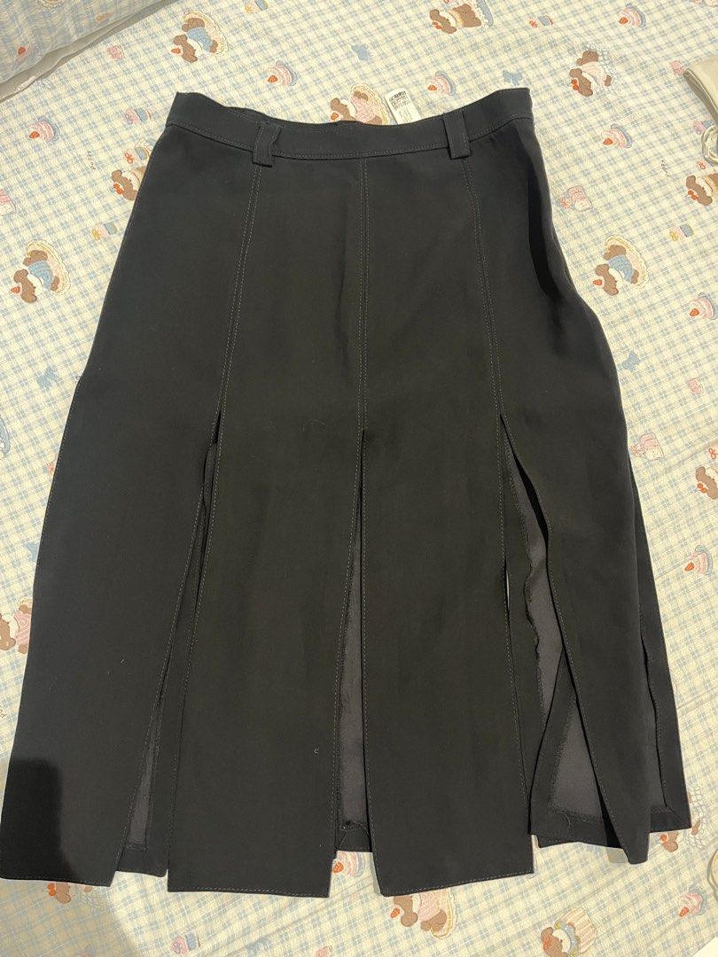 Zara Black Split Midi Skirt (Category: Skirts) located in Caloocan City. Submitted by ann_in_declutter (Listing ID 1467502816, Image 1). Description: Used but still in good condition with ww pictures.