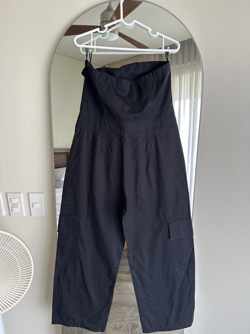 Zara Black Strapless Cargo Jumpsuit Size L (Category: Jumpsuits) located in Taguig. Submitted by anarinamizu (Listing ID 1467426986, Image 2). Description: - Brand: Zara - Style: Strapless cargo jumpsuit with side leg pockets - Fit: Fitted bodice with straight leg trousers - Size: Large - Origin: Made in Morocco - Condition: Great basic piece, easily dressed up or down - Meetups and shipping available - Message for inquiries.