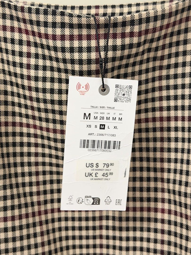 Zara Checkered Plaid Mini Dress Size M (Category: Dresses) located in Quezon City. Submitted by 8s_closet (Listing ID 1467464415, Image 3). Description: - Brand: Zara - Style: Checkered plaid mini dress - Colorway: Black, beige, and dark red - Features: Square neckline, thick straps, and small front pocket detail near hem - Size: Medium (M) - Condition: Brand new with tags (BNWT) including original retail price.