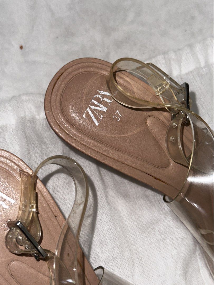 Zara Clear Rhinestone Pointed Toe Slingback Heels Size 37 (Category: Heels) located in Malolos. Submitted by josaruby (Listing ID 1467402966, Image 2). Description: - Brand: Zara - Style: Slingback heels with stiletto heel and adjustable buckle ankle strap - Material: Nude and clear vinyl - Details: Pointed toe covered in sparkling rhinestones - Size: EU 37 - Inclusion: Original Zara dust bag - Condition: Excellent, like new - Needs cleaning, wip