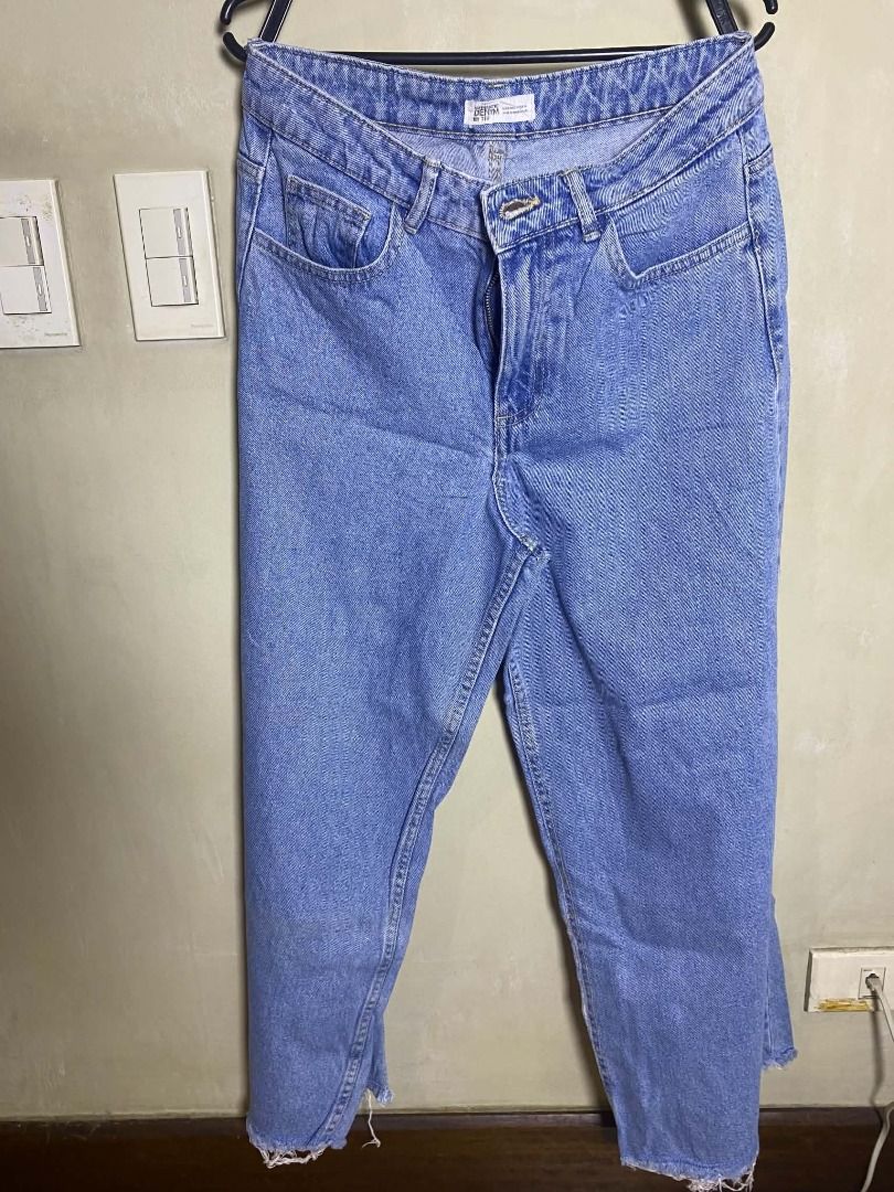 Zara Denim Jeans Light Blue Size S (Category: Jeans) located in Quezon City. Submitted by ultra_seller (Listing ID 1467373561, Image 1). Description: Brand: ZARA Size: EU 36 / US 4 Color: Medium-wash blue denim with visible fading. Cut: Appears to be a relaxed straight-leg silhouette. Hems: Both legs have raw, frayed edges. These may be intentional, altered, or worn. Fabric: Denim texture looks reasonably intact, with no obvious large holes or ma