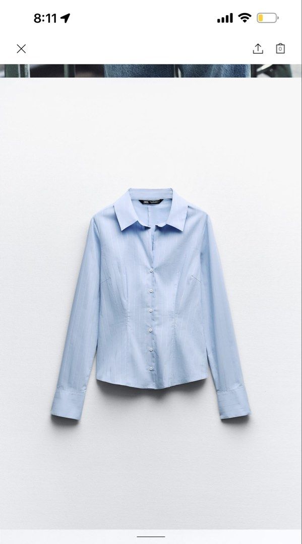 Zara Metallic Thread Striped Fitted Shirt (Category: Shirts) located in Quezon City. Submitted by morgan_rysblk (Listing ID 1467367738, Image 3). Description: - Brand: Zara - Color: Light blue with vertical metallic thread stripes - Size: XS - Love this! Too small na for me - Used once for school travel.