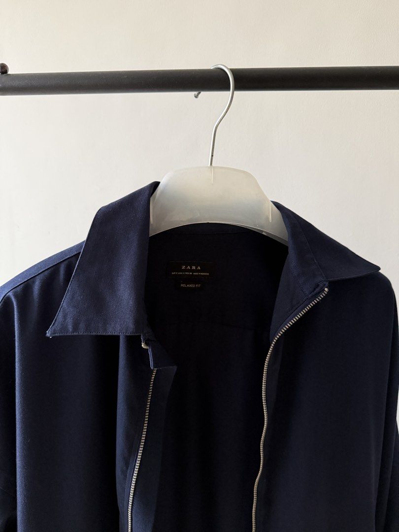 Zara Navy Blue Relaxed Fit Zip Jacket Size S (Category: Coats, Jackets and Outerwear) located in Paranaque City. Submitted by freshlysteezed (Listing ID 1467446051, Image 1). Description: - Brand: Zara - Color: Navy blue - Size: S - Fit: Relaxed fit - Details: Full zip front, classic collar, and clean back yoke - Condition: Inner pocket thingy needs stitching. Great staple piece, from a smoke-free home.