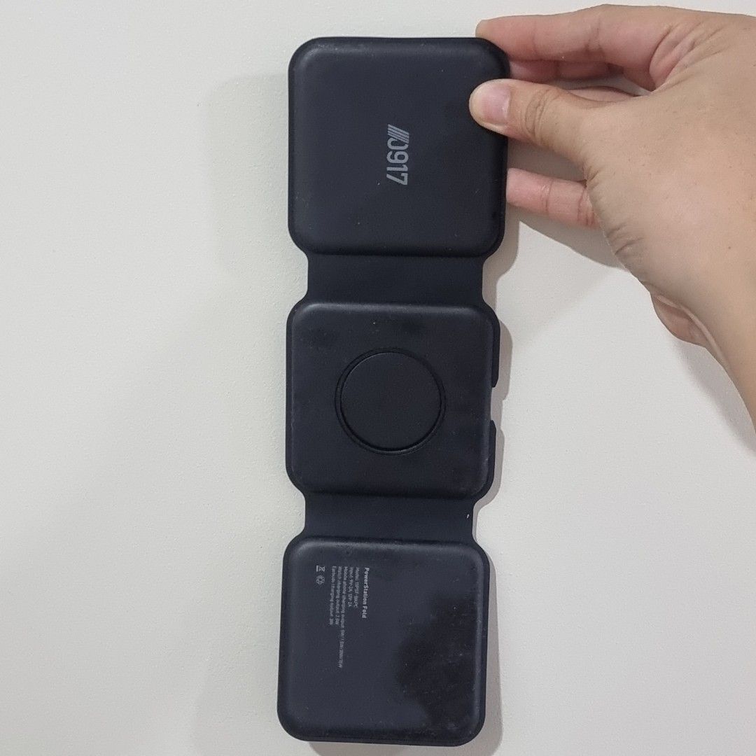 0917 PowerStation Fold [15W Wireless Charger] (Category: Chargers & Cables) located in Pasig City. Submitted by lesmitch (Listing ID 1467643915, Image 3). Description: - Color: Matte Black - Condition: barely used, just needs cleaning since some parts have been a bit sticky - Features: Tri-fold design - charges your phone, smartwatch, and earbuds all at once - Port: Type-C input - Perfect for daily use, travel, and decluttering your charging stat