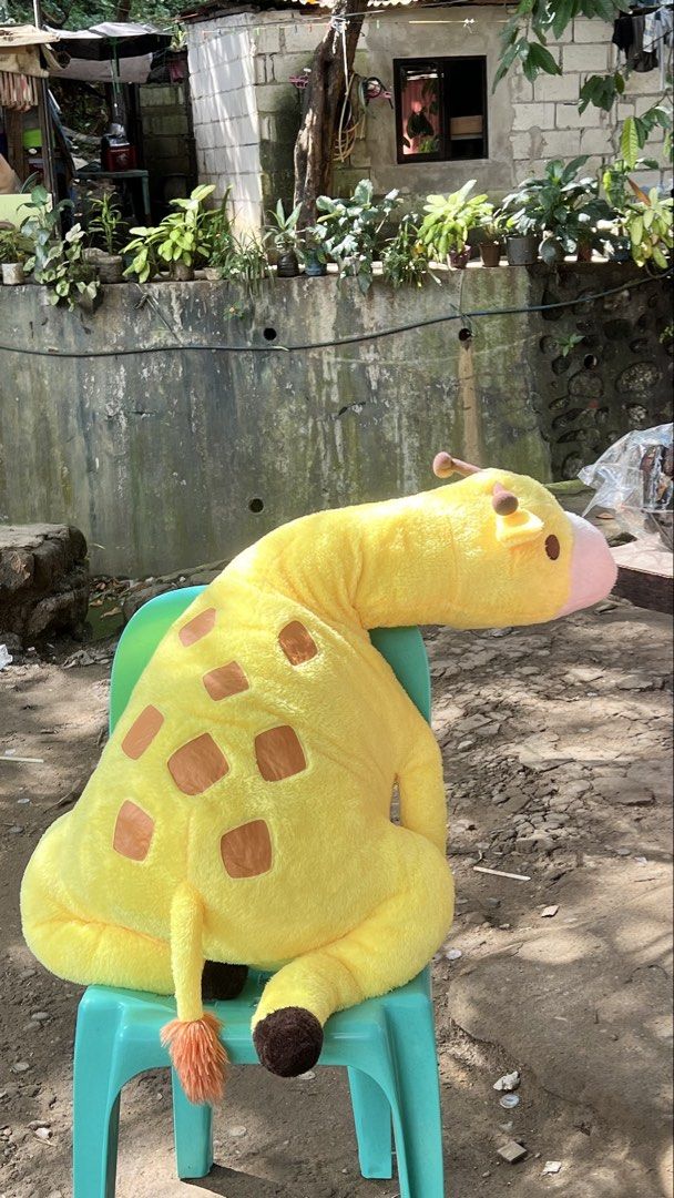 110cm Large Yellow Giraffe Stuffed Toy Plush (Category: Plushies & Soft Toys) located in San Jose del Monte. Submitted by faithyfairy_ (Listing ID 1467718974, Image 1). Description: - Big yellow giraffe plush toy - Super soft and fluffy material, great for hugging - Features brown patches, a long neck, orange tail end, and brown hooves - Clean and well-maintained condition.