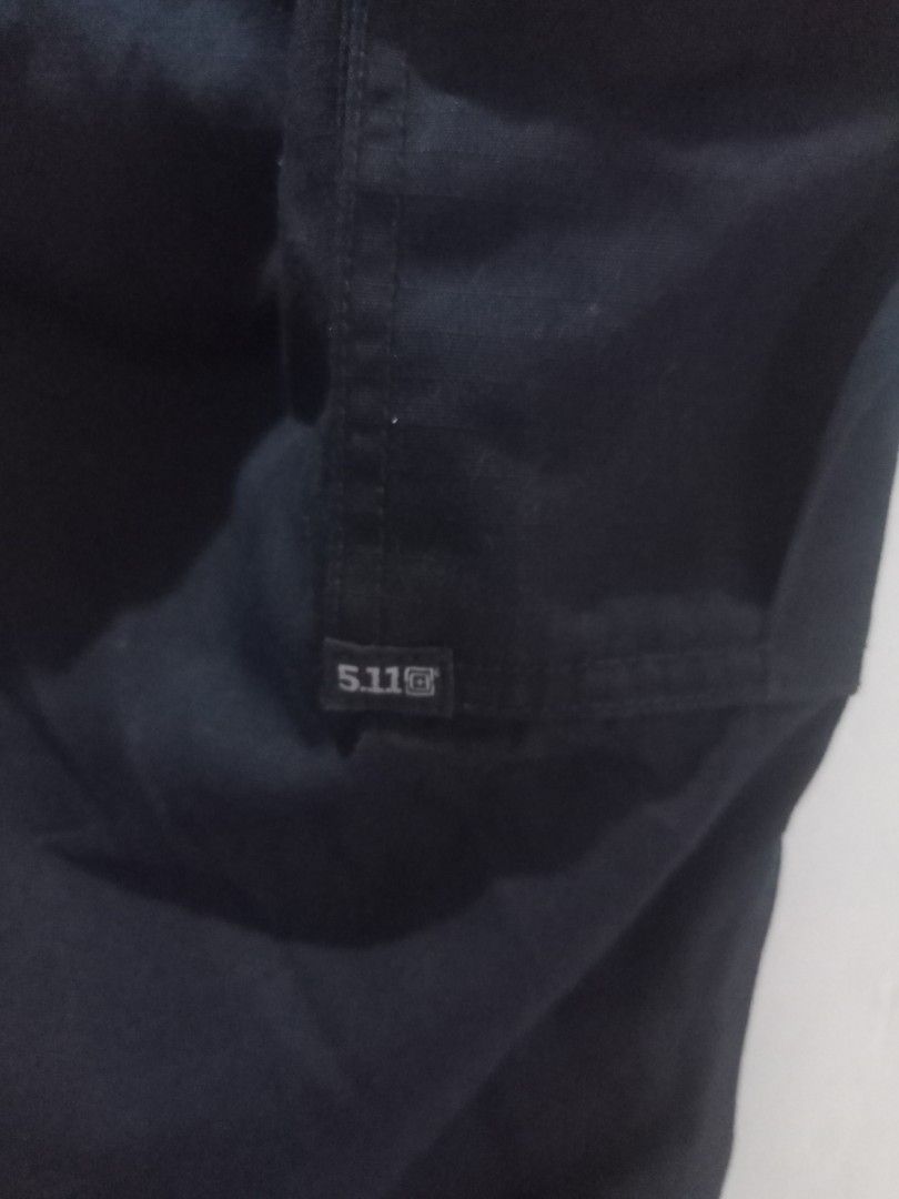 5.11 Tactical Cargo Pants US 6 Regular size 31 (Category: Trousers) located in Taguig. Submitted by mvdsh0p2022 (Listing ID 1467615037, Image 3). Description: - Brand/Model: 5.11 Tactical Cargo Pants - Color: Black - Size: US 6 Regular / UK 10 / FR 38 / DE 36 - Material: 65% Polyester, 35% Cotton (Durable Ripstop Fabric) - Origin: Made in Vietnam - Condition: Clean inside and out - Features: Multiple utility pockets, ideal for outdoor use or work