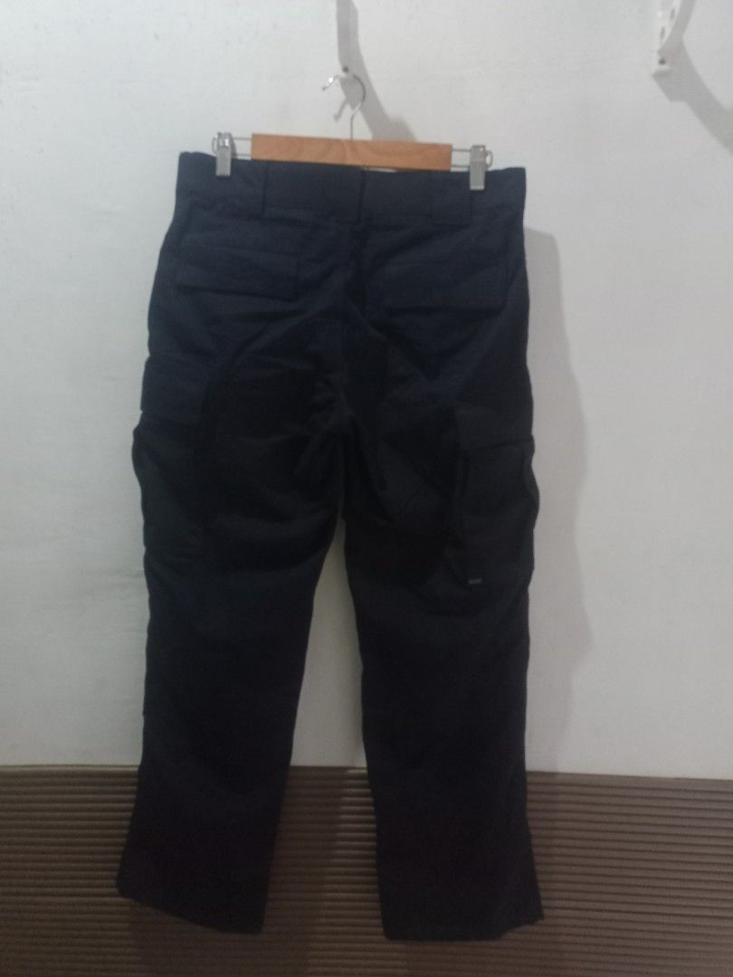 5.11 Tactical Cargo Pants US 6 Regular size 31 (Category: Trousers) located in Taguig. Submitted by mvdsh0p2022 (Listing ID 1467615037, Image 2). Description: - Brand/Model: 5.11 Tactical Cargo Pants - Color: Black - Size: US 6 Regular / UK 10 / FR 38 / DE 36 - Material: 65% Polyester, 35% Cotton (Durable Ripstop Fabric) - Origin: Made in Vietnam - Condition: Clean inside and out - Features: Multiple utility pockets, ideal for outdoor use or work