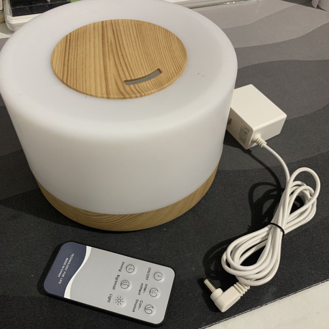 7 Color LED Lamp Air Humidifier with Remote Control (Category: Home Fragrance) located in Pasig City. Submitted by itzryl (Listing ID 1467720882, Image 1). Description: Specifications: Input voltage:AC100-240V 50/60Hz Out voltge:DC24V 500mA Timer mode: 10s/2hours/4hours/ON LED color: 7 soothing LED light Ultrasonic frequency:2.4MHz Size:160 x 160 x 120mm Volume:Max 500ml Details: - used for only 1 month - no damages - no box RFS: Not needed and n