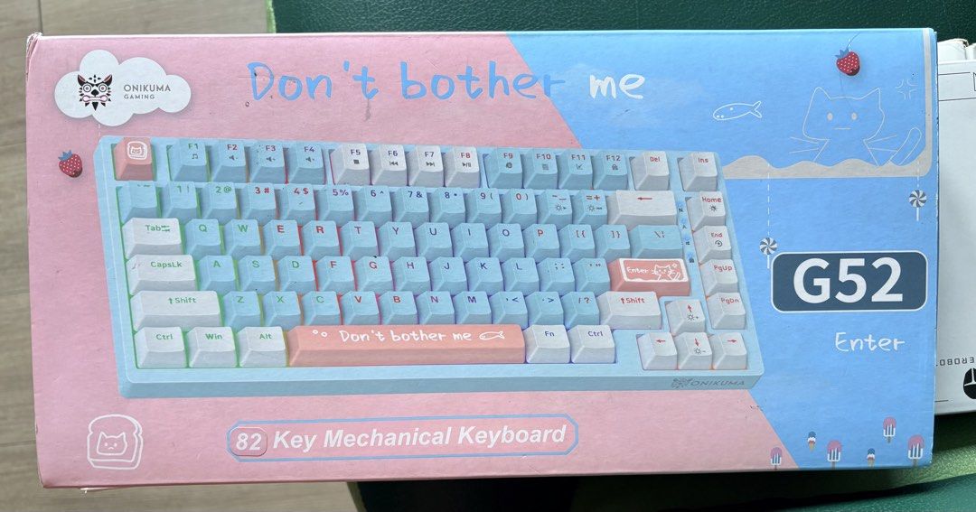82 Key Mechanical Keyboard ONIKUMA G52 with 82 key backlight and replaceable gaming keyboard (Category: Computer Keyboard) located in Marikina City. Submitted by jr.listings (Listing ID 1467669049, Image 1). Description: The Onikuma G52 is a budget-friendly, wired mechanical keyboard featuring a compact 75% form factor with 82 keys. It is designed specifically to maximize desk space for gamers and office workers while retaining dedicated arrow ke